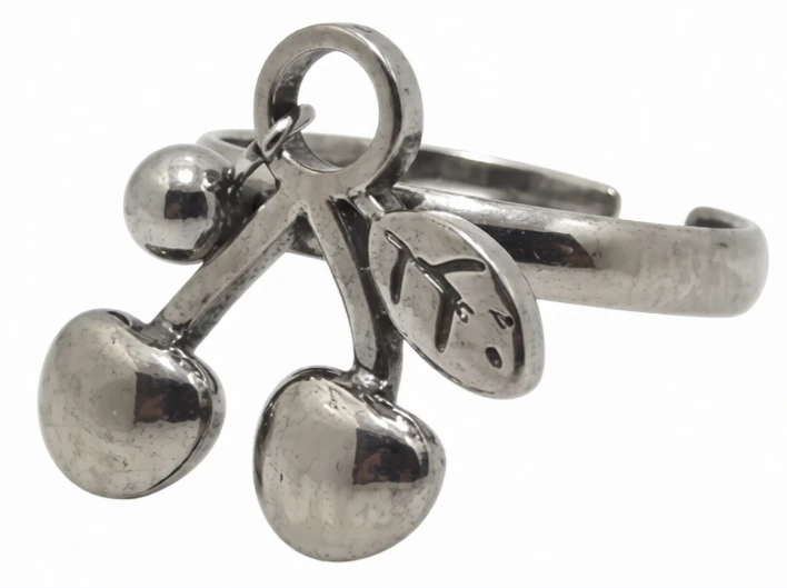 Anillo de acero quirurgico cereza